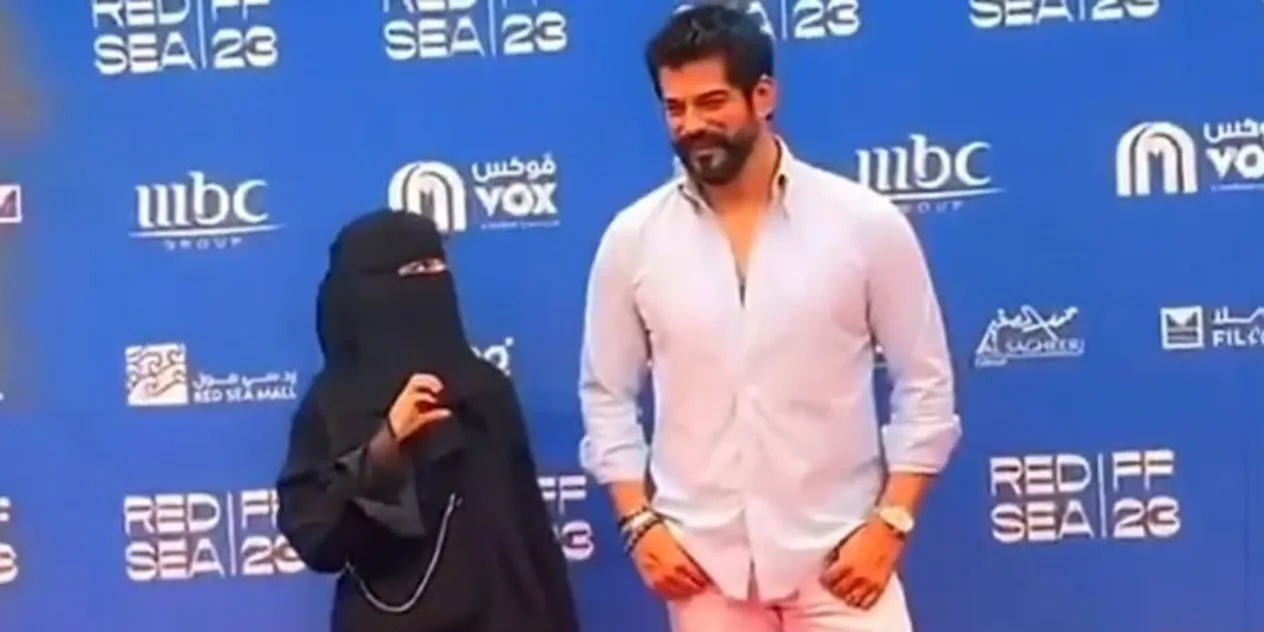 Burak Özçivit, kendisiyle kalp işareti yapmak isteyen kadın hayranını reddetti